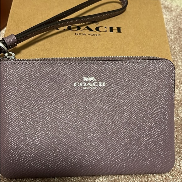 Coach Accessories - NWT Coach wristlet comes with tags and box